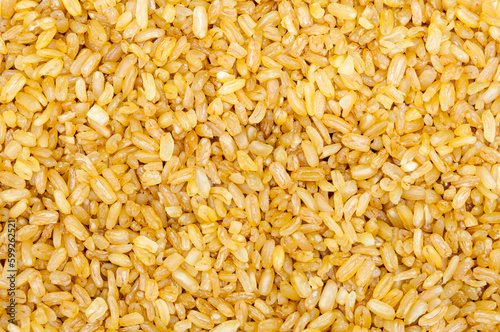 background of rice grains close-up