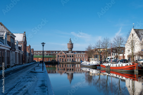 Water canal in the historic city of Sneek and winter