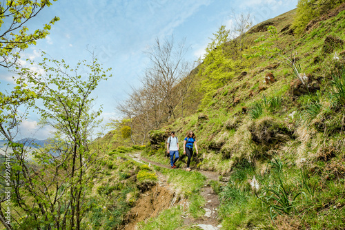 Young couple hiking in a magnificent landscape of the Larrau gorges in the French Basque country