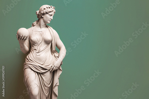 Marble statue of an ancient Greek goddess doing sports on pastel background. Ball game player sculpture. Beauty standards, ideal body, sports activity, fitness, sports advertising concept.AI generated