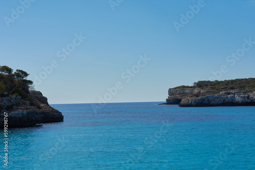 Crystal clear blue waters at S'Amarador beach and Cala Mondragó on the island of Mallorca. Balearic Islands. Spain © JaviJfotografo