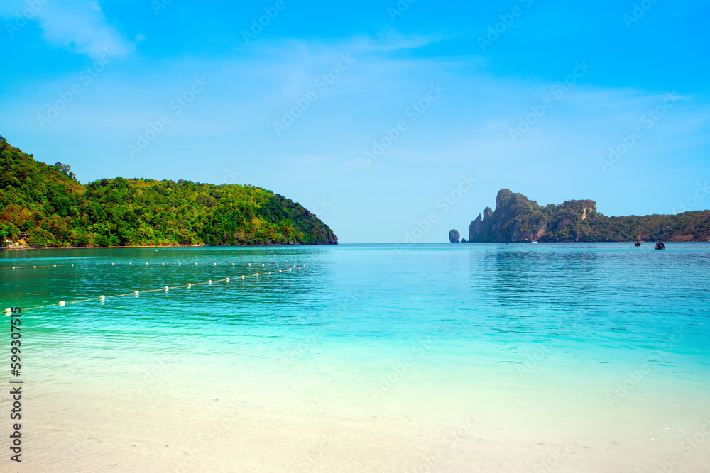 Beautiful landscape of the Indian Ocean coast with a sandy beach on the Phi Phi island