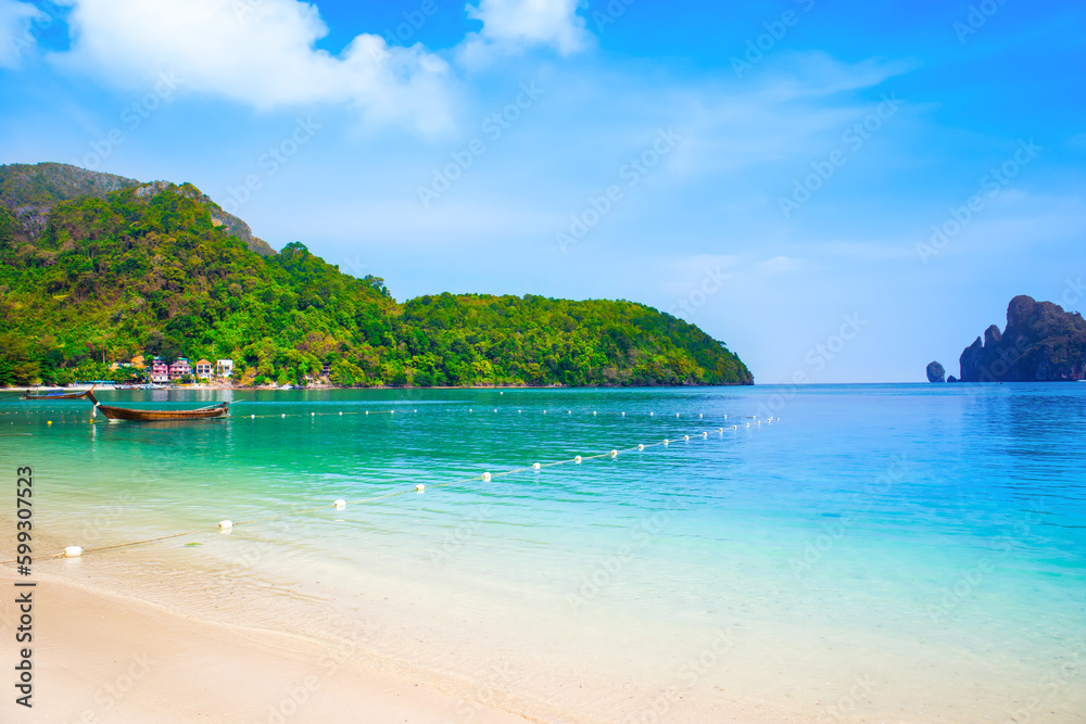Fototapeta premium Beautiful landscape of the Indian Ocean coast with a sandy beach on the Phi Phi island, Thailand