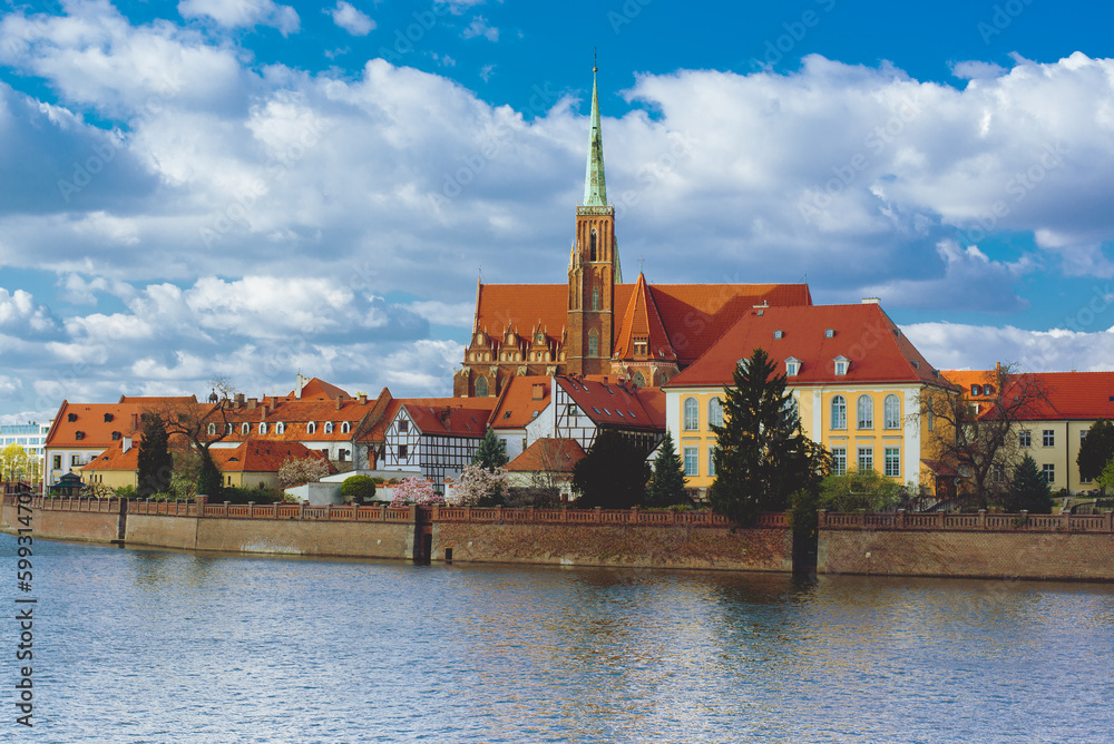 Poland, Wroclaw, April 16, 2022. View to Odra River and Tumski Island. Old Town of Wroclaw in Spring 