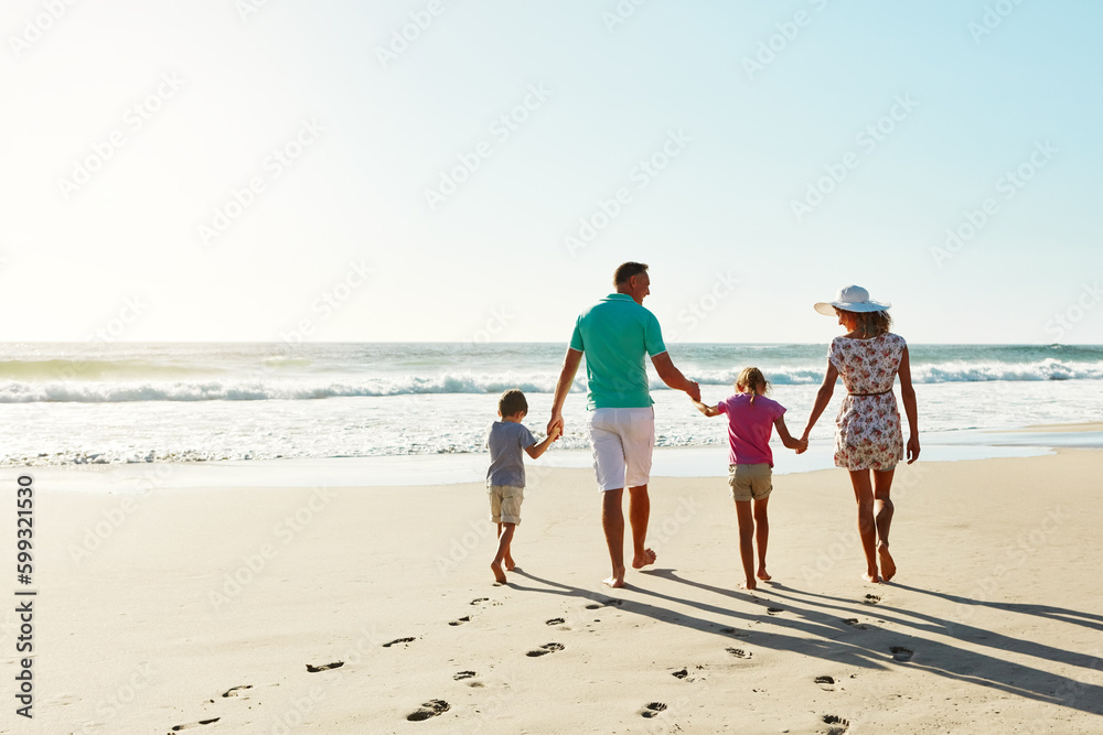 Summer days were made for the beach. a family enjoying some quality time together at the beach.