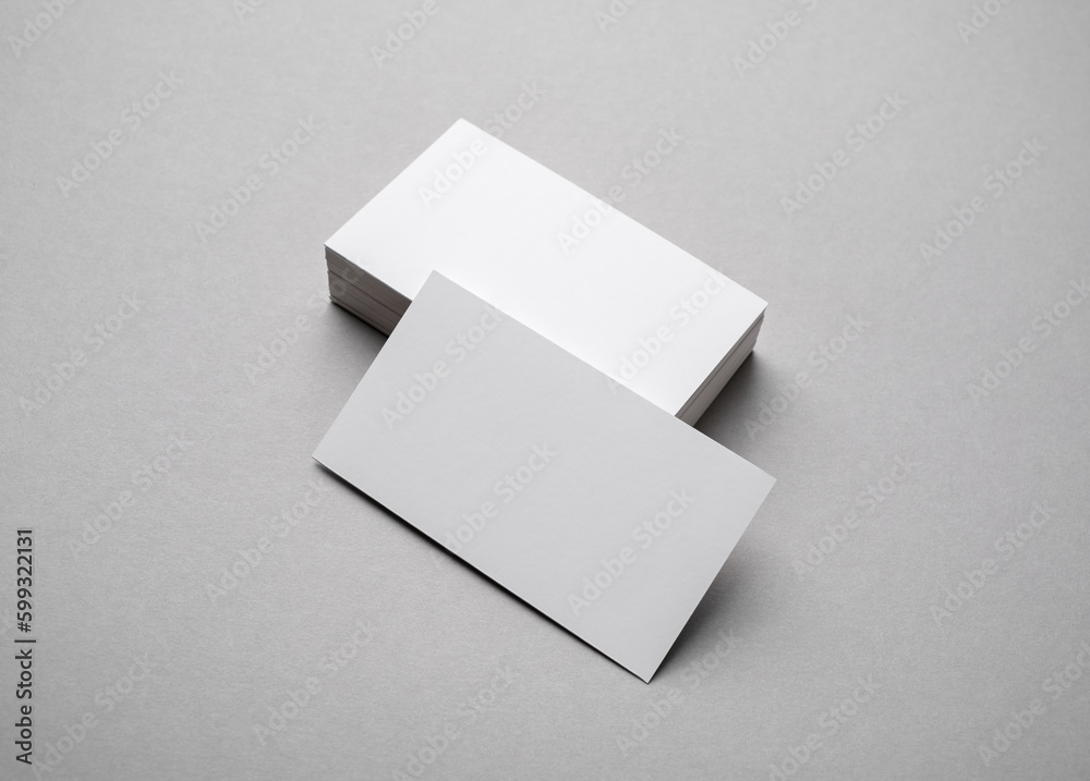 Blank business cards on gray paper background. Template for graphic designers portfolios. Blank business cards on gray paper background. Template for graphic designers portfolios.
