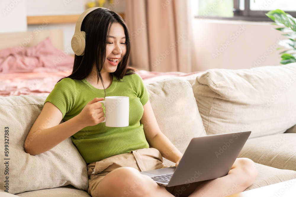 Portrait of a happy asian woman relaxing at home Portrait of a happy asian woman relaxing at home