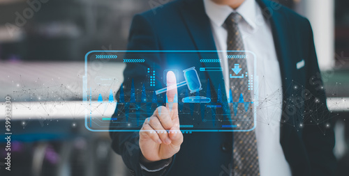 Tablou pe pânză Businessman using finger touch hammer icon,futuristic line network, concept bid