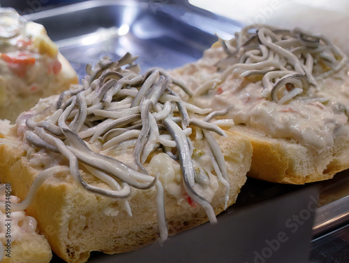 Bilde på lerret Traditional Tapas, bread toast topping with Spanish Baby eels, Surimi, Angulas,