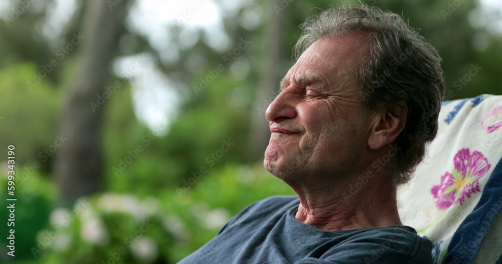 Candid older man doing funny faces grimacing Candid older man doing funny faces grimacing