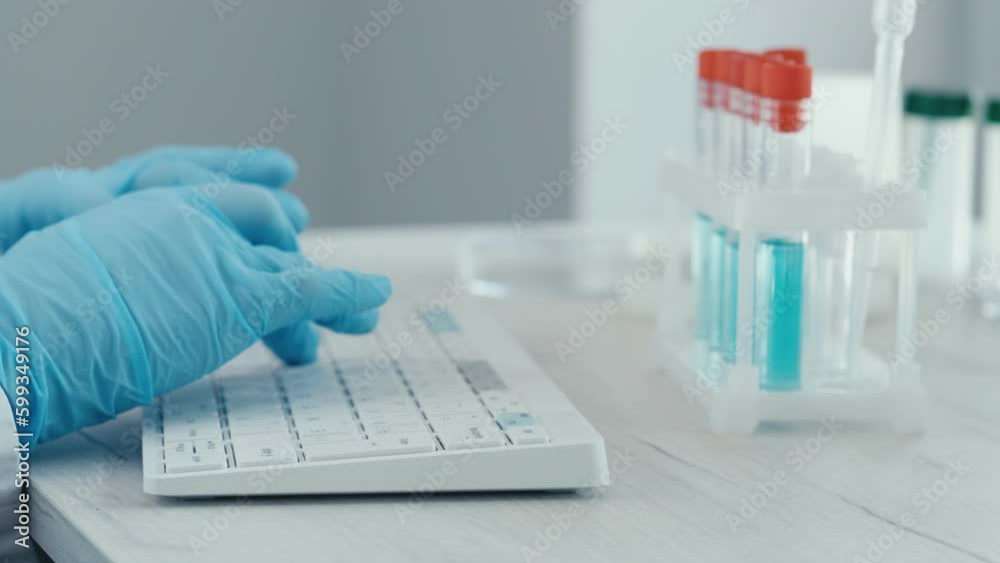 The doctor prints on the keyboard, enters information into the client base of patients on the computer. Also, the study of new chemical compounds in medical laboratory in order to develop new drugs. The doctor prints on the keyboard, enters information into the client base of patients on the computer. Also, the study of new chemical compounds in medical laboratory in order to develop new drugs.