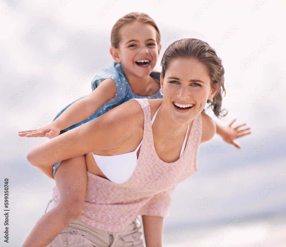 Spending quality time with mom. A little girl and her mother at the beach. Spending quality time with mom. A little girl and her mother at the beach.
