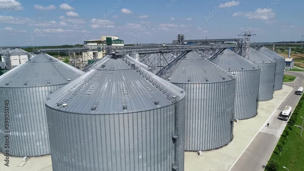 Large silver granary. Storage of grain. Factory for the production of mixed fodders. Factory for processing agricultural products. Feed Mill. Large silver granary. Storage of grain. Factory for the production of mixed fodders. Factory for processing agricultural products. Feed Mill.