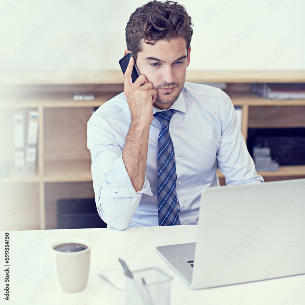 Talking to a client. a handsome young businessman working in his office. Talking to a client. a handsome young businessman working in his office.