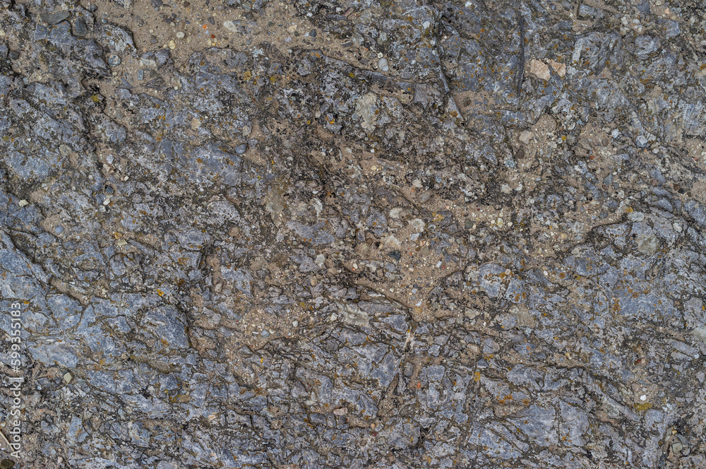 Obraz premium imagen detalle textura suelo de piedra de distintas profundidades con arena en las grietas 