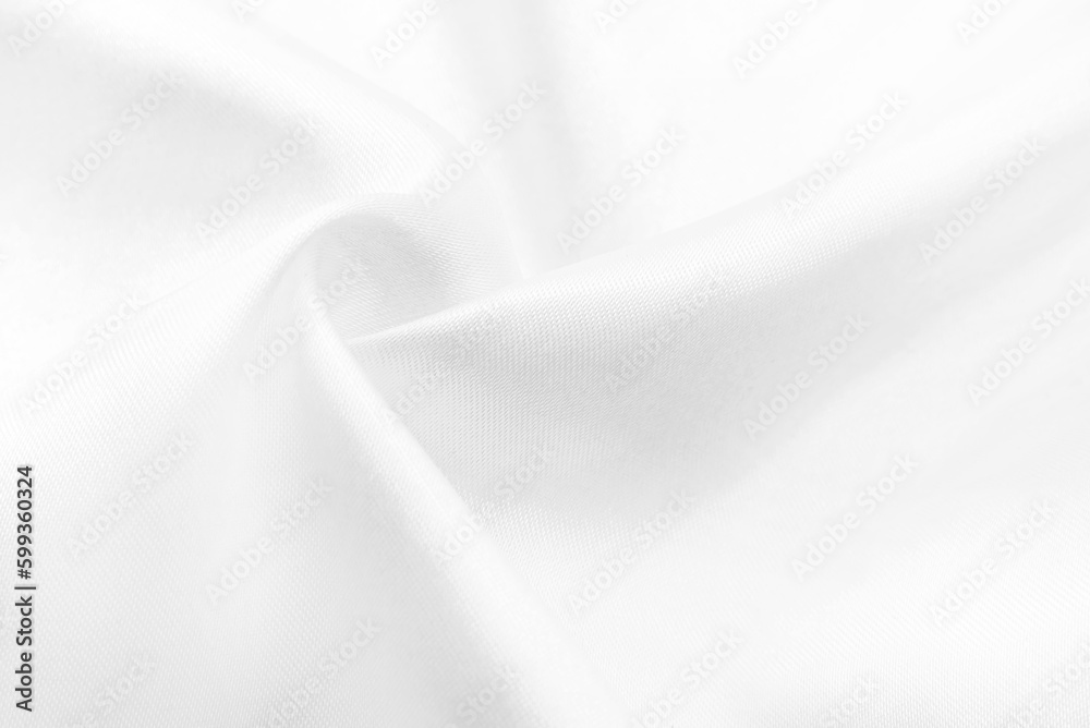 Naklejka premium A twisted piece of white fabric. White material or texture with waves and folds. Wrinkled white fabric
