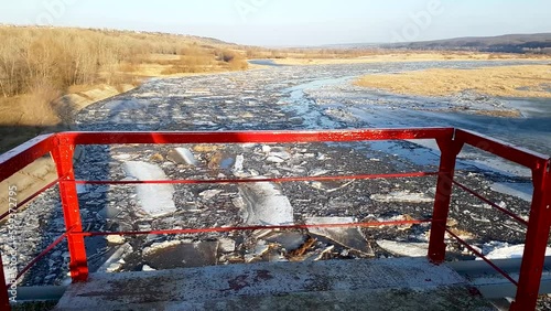 View from the observation point on the ice drift along the river.