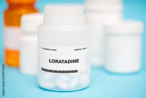 Loratadine medication In plastic vial