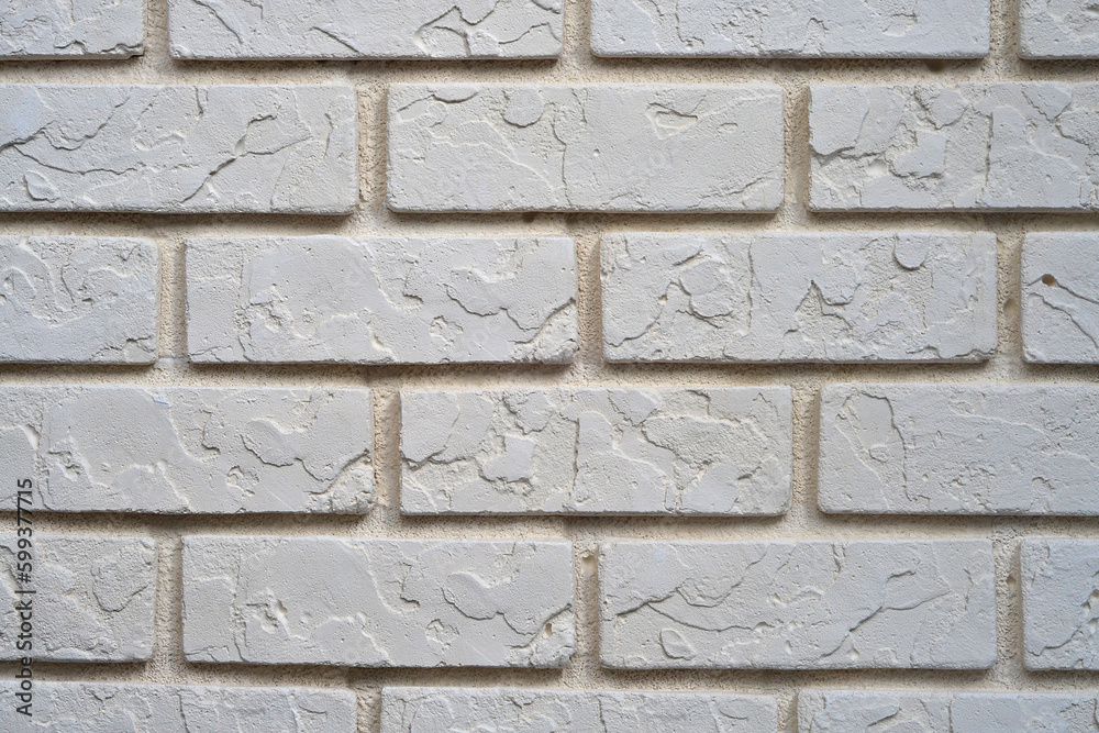 Fototapeta premium a wall in a beige brick house