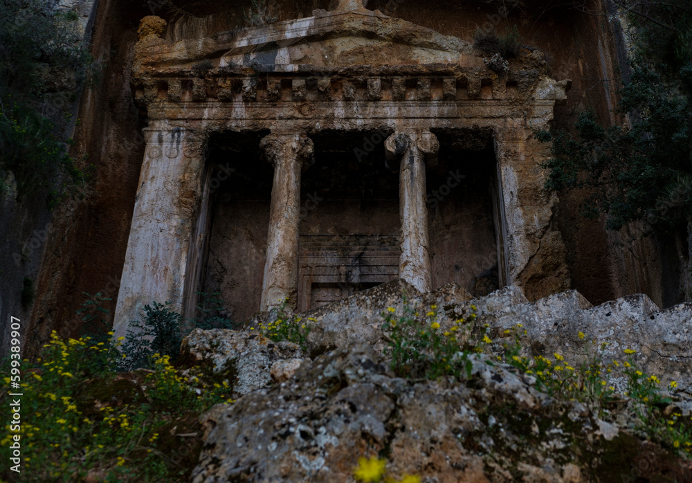Lycian cave tombs in rocks close up details, ancient civilization architecture, Tomb of Amyntas in Fethiye