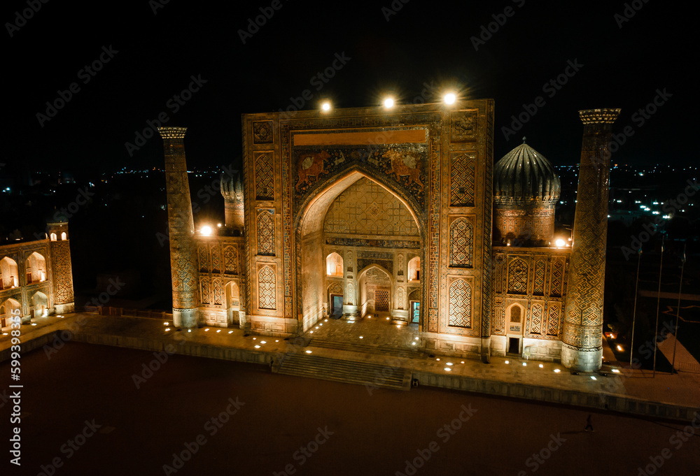 Samarkand, Uzbekistan aerial view of Ulug bek madrassah,  Colorfull Registan square at night