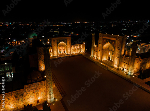 Samarkand, Uzbekistan aerial view of Ulug bek madrassah,  Colorfull Registan square at night photo