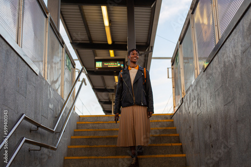 African girl train station