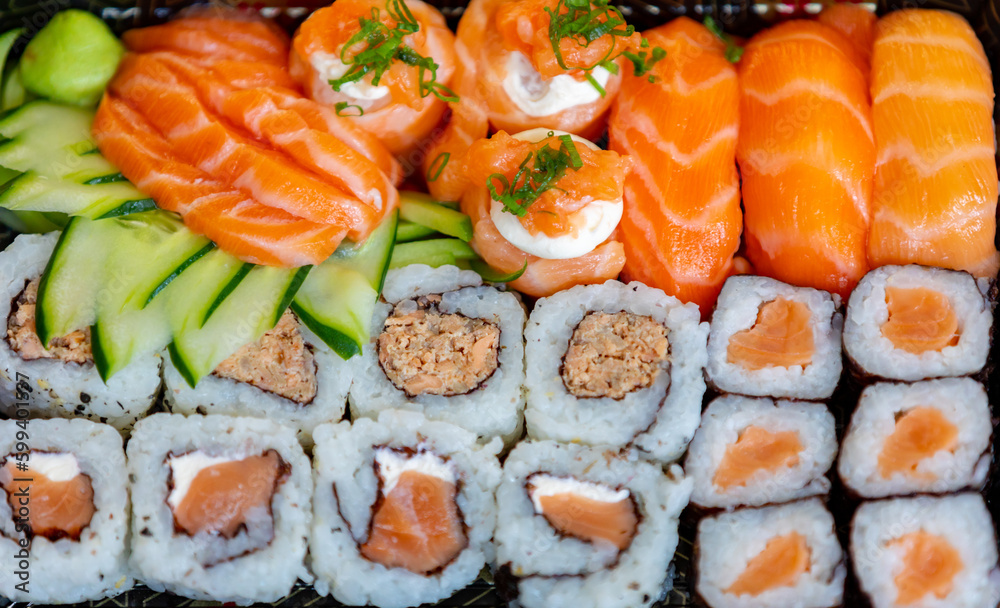 Traditional salmon sushi, typical Japanese food. Traditional salmon sushi, typical Japanese food.