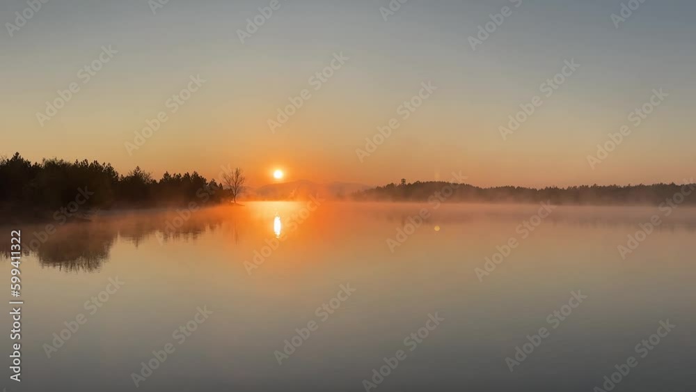fog layer on the lake and sunrise view fog layer on the lake and sunrise view