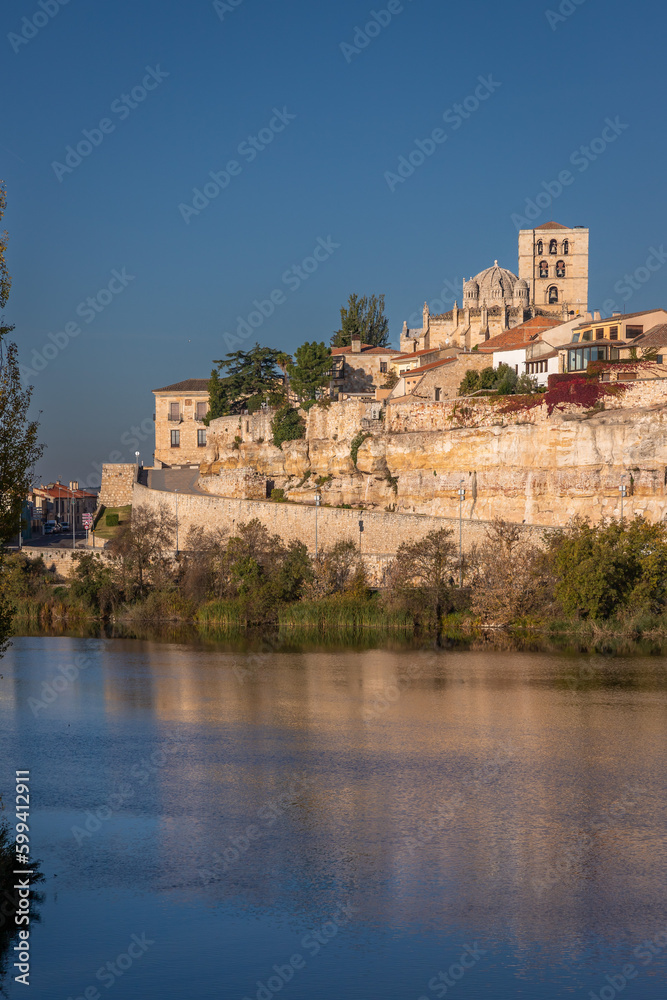 Beautiful panoramic view of Zamora cityscape during Autumn season, from the other side of the Douro River, in Spain.