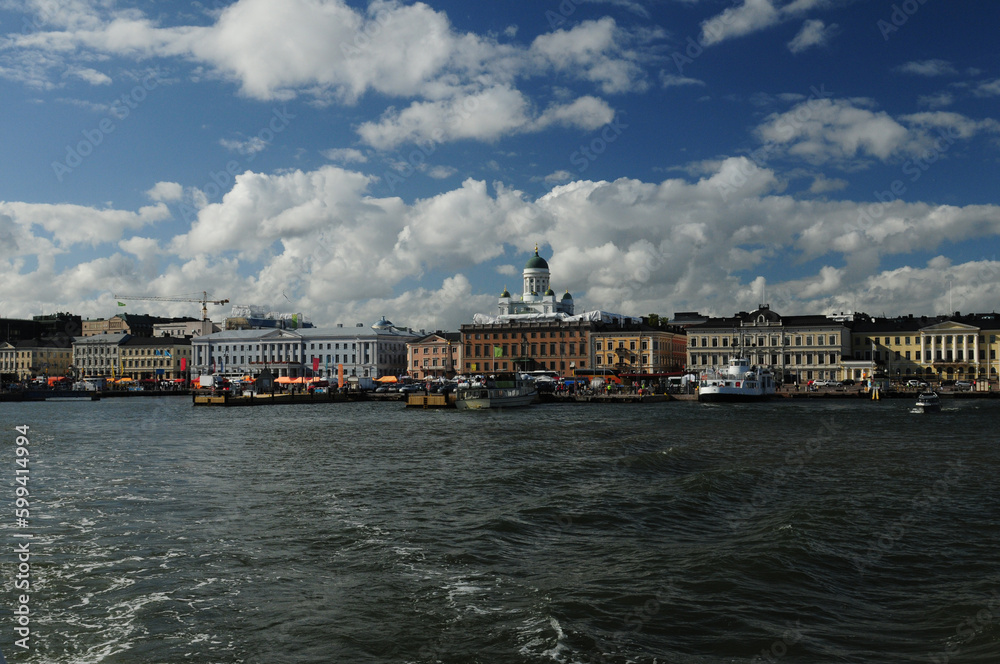 Obraz premium View From A Leaving Boat To The Waterfront Market Place In Helsinki Finland On A Beautiful Sunny Summer Day With A Few Clouds In The Blue Sky