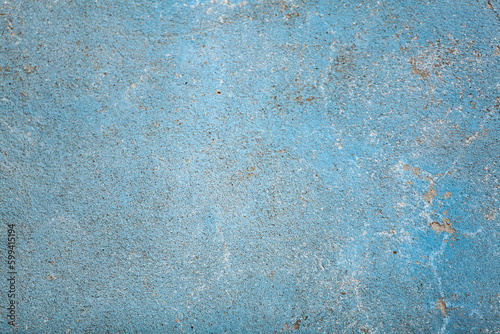 Blue concrete surface with old faded paint. Old cement texture