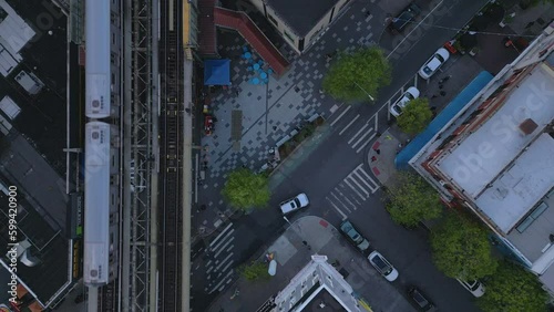 overhead aerial view of intersection next to elevated subway track in Bushwick Brooklyn photo