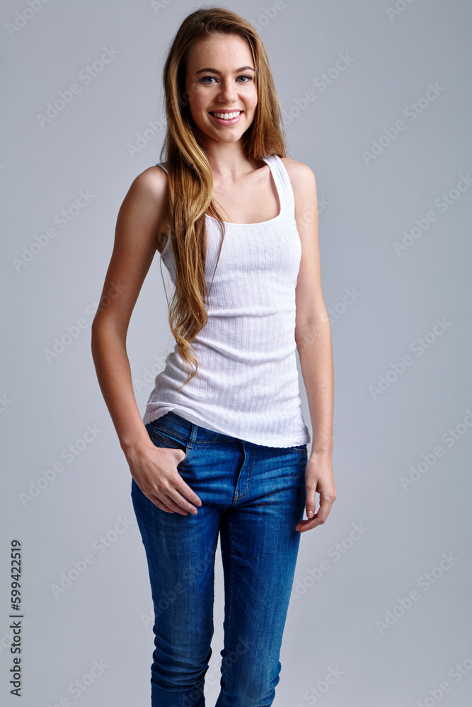 Keeping things casual. Studio portrait of a casually dressed young woman.
