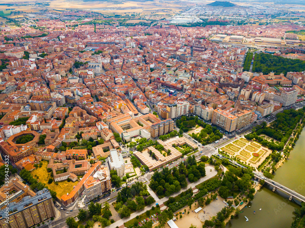 Panoramic aerial view of district of Valladolid with modern apartment buildings and river