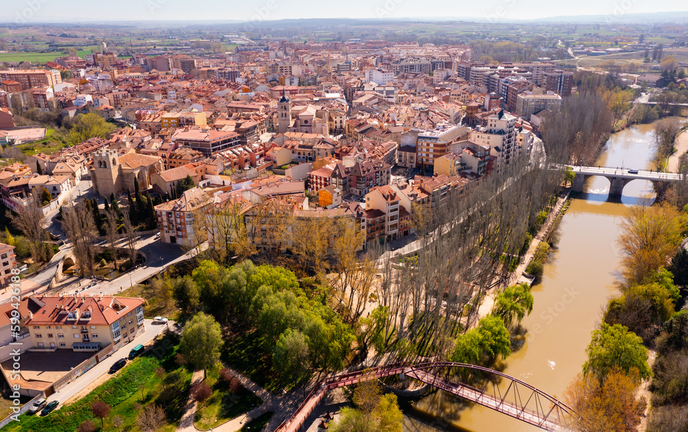 Aerial photo of Aranda de Duero with view of Duero river, Ribera del Duero comarca, Spain.