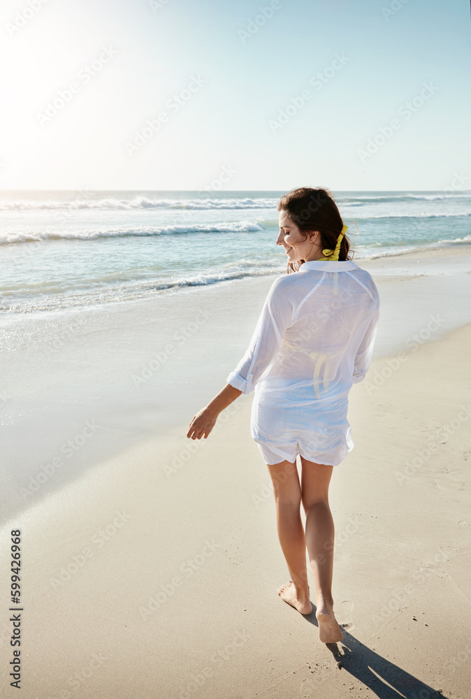 The beach is where my heart is at. a beautiful young woman enjoying her day at the beach. The beach is where my heart is at. a beautiful young woman enjoying her day at the beach.