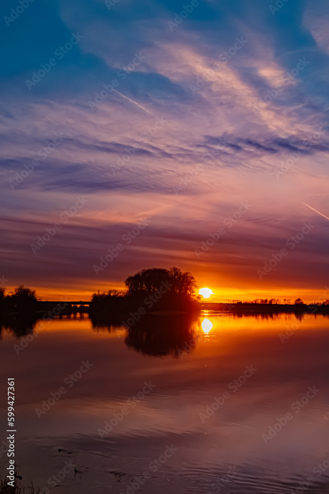 Sunset with reflections near Mettenufer, Danube, Bavaria, Germany