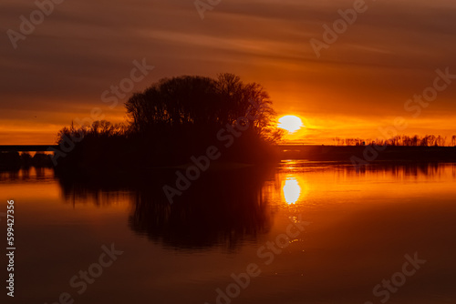 Sunset with reflections near Mettenufer, Danube, Bavaria, Germany © Martin Erdniss
