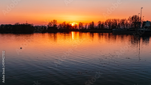 Sunset with reflections near Plattling, Isar, Bavaria, Germany