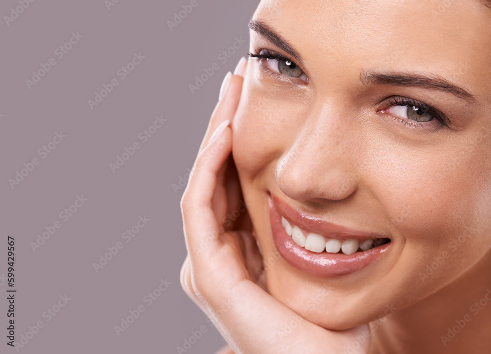 Seeing her beauty close up. Beauty shot of a beautiful young woman with perfect skin against a gray background. Seeing her beauty close up. Beauty shot of a beautiful young woman with perfect skin against a gray background.