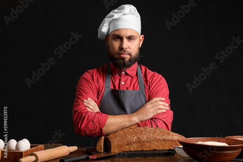 Male baker at table with ry...