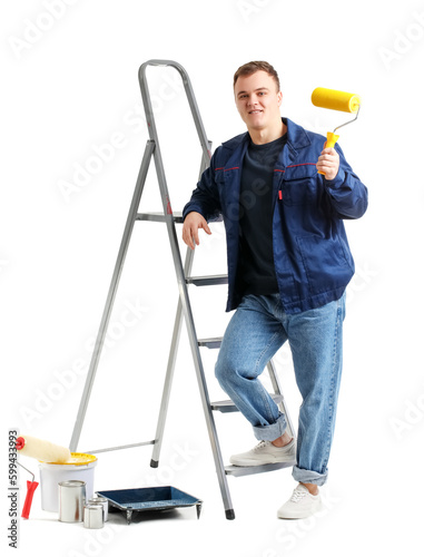 Young man with roller, ladd...