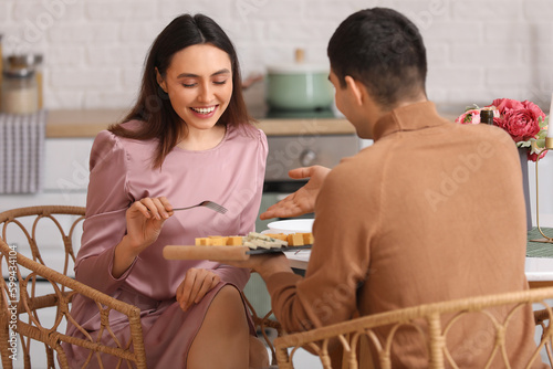 Young couple with cheese pl...