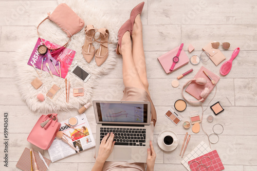 Woman with laptop and acces...