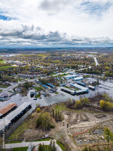 Explore the mesmerizing beauty of Keswick, Georgina, Ontario,he images feature striking blue skies, boats by Claredon Beach, and the bustling Keswick Marina, capturing the essence of lakeside living. 