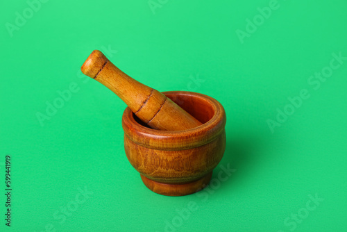 Traditional wooden mortar a...
