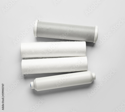 New water filter cartridges on grey background