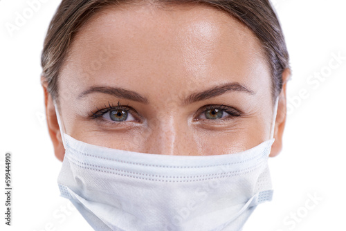 Youre in safe hands. A closeup image of a beautiful surgeon wearing a surgical mask.