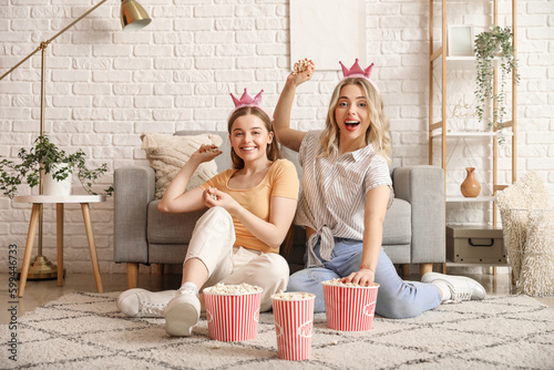 Happy young women wearing p...